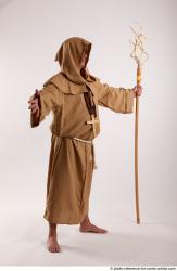 JOEL_ADAMSON STANDING POSE WITH A MAGIC STICK